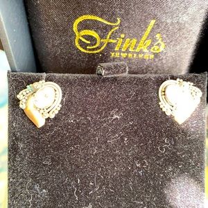 Sterling pierced earrings with purple stone